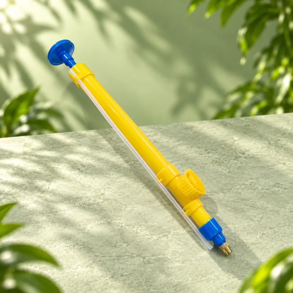 Pump sprayer accessory · Yellow in a green product setting